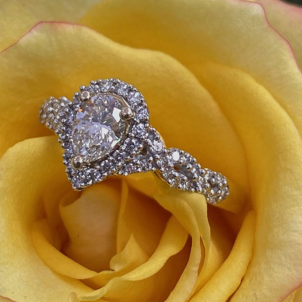 14K Yellow Gold Diamond Engagement Ring With A .56 Carat Pear Cut Diamond