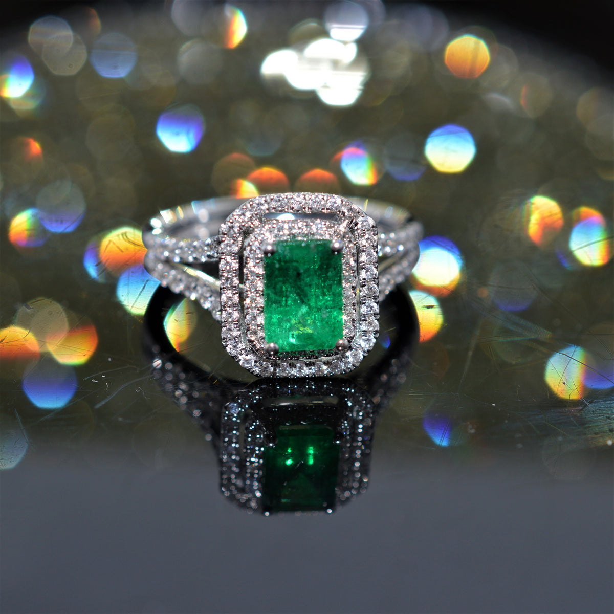 18K White Gold Emerald Cut Emerald and Double Diamond Halo Ring