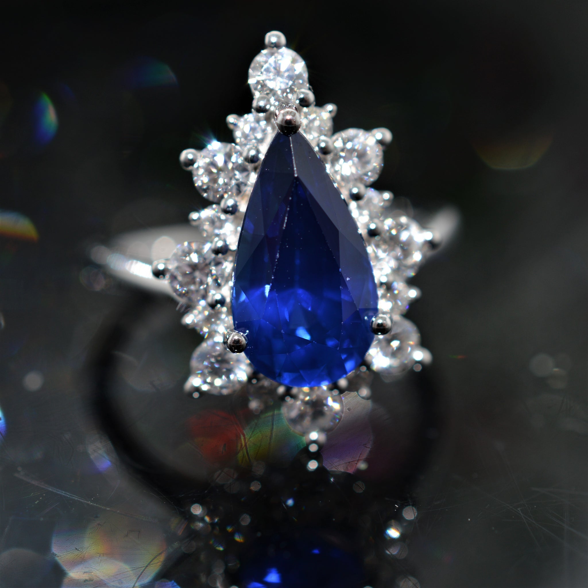 Teardrop sapphire deals engagement rings