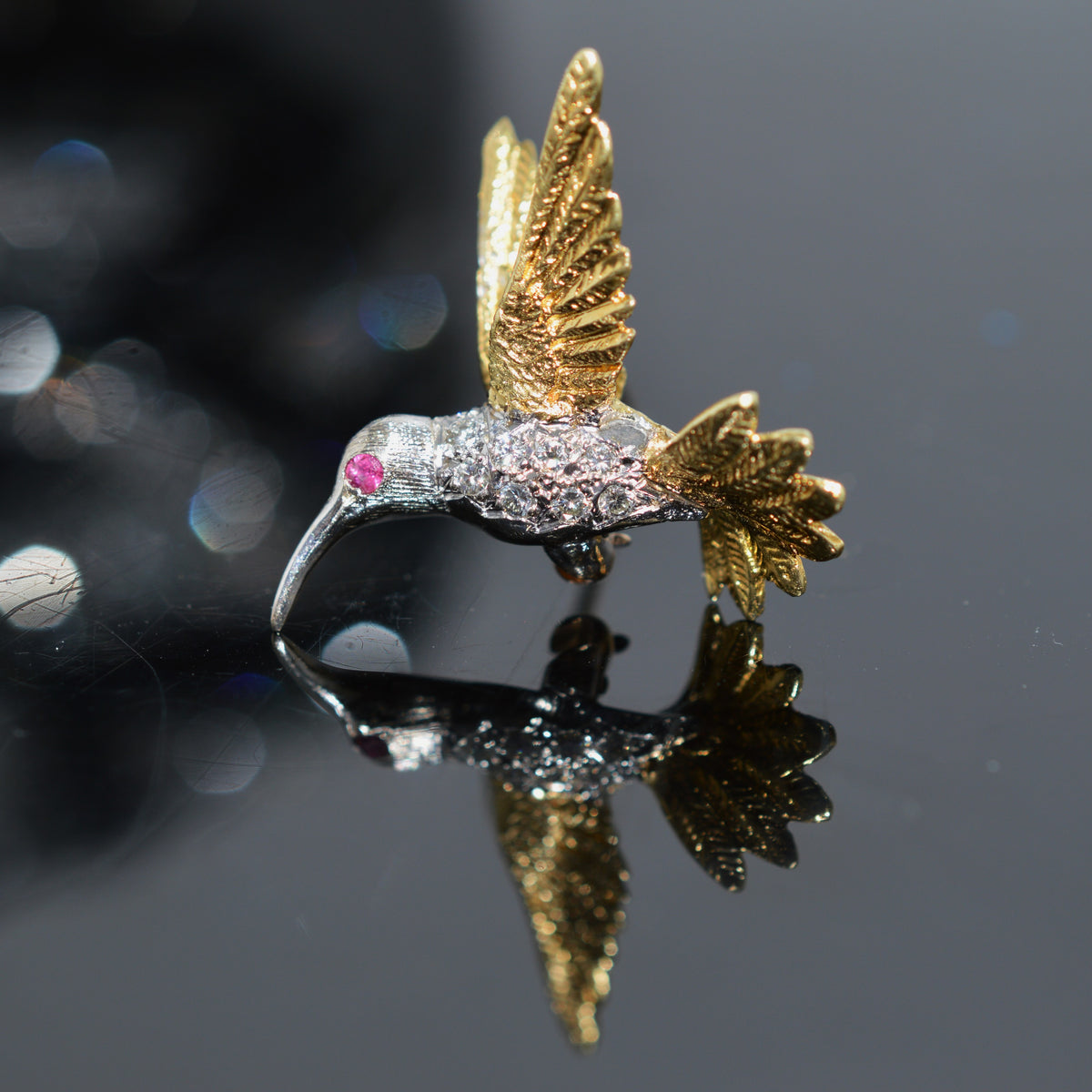 18K Two Tone Gold Hummingbird Brooch With Diamonds And A Ruby Eye