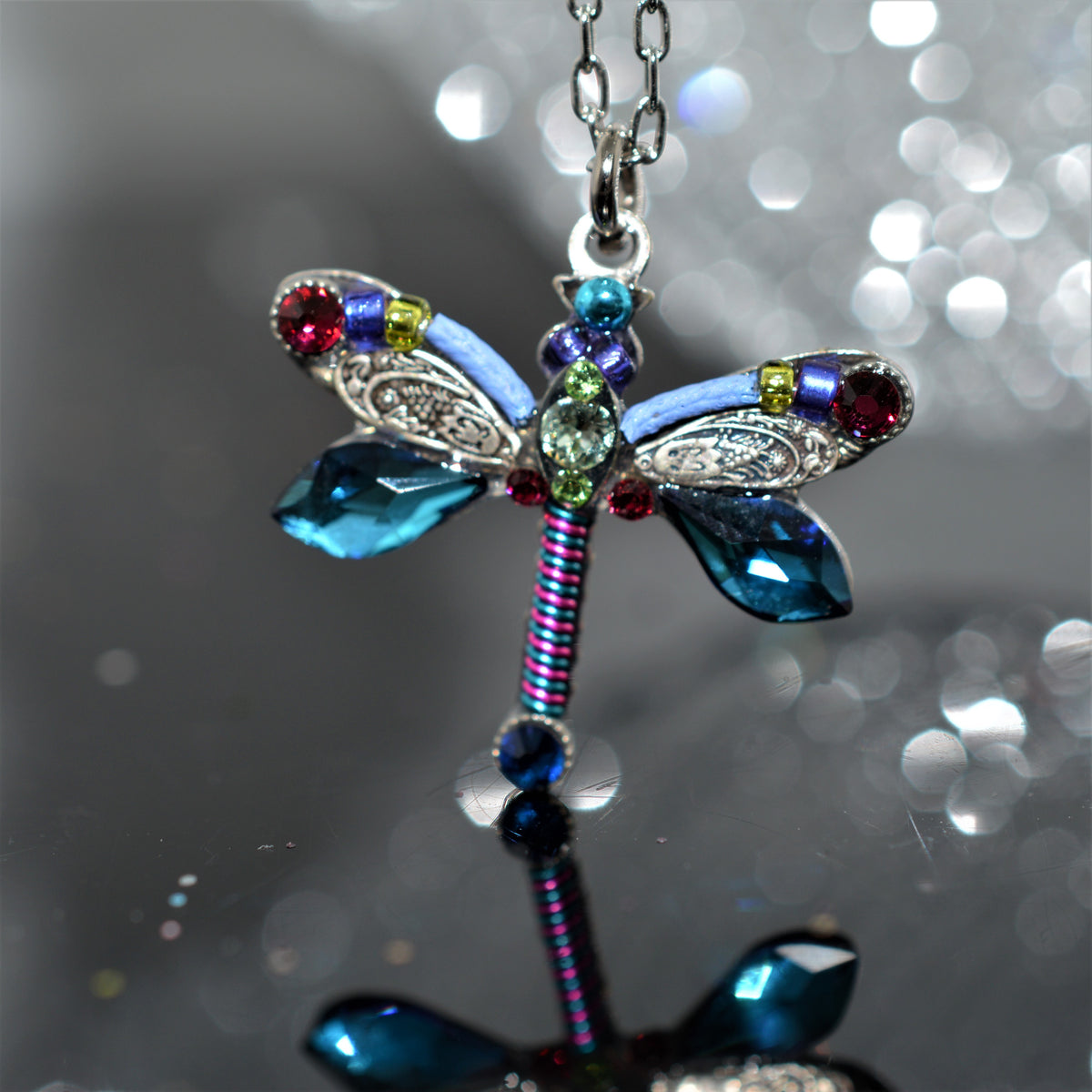 Antique Silver Plated Dragonfly Pendant With Bermuda Blue Colored Crystals by Firefly