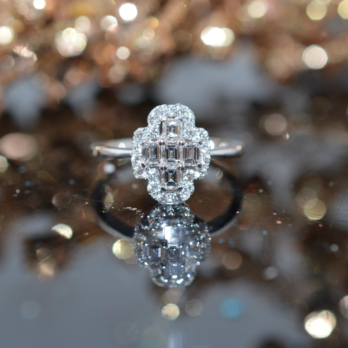 18K White Gold Diamond Ring With Round And Emerald Cut Diamonds