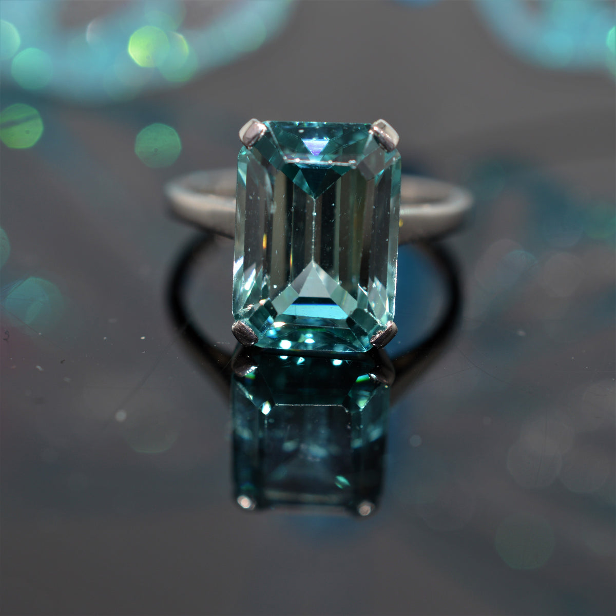 Platinum Ring Set With an Emerald Cut Blue Zircon