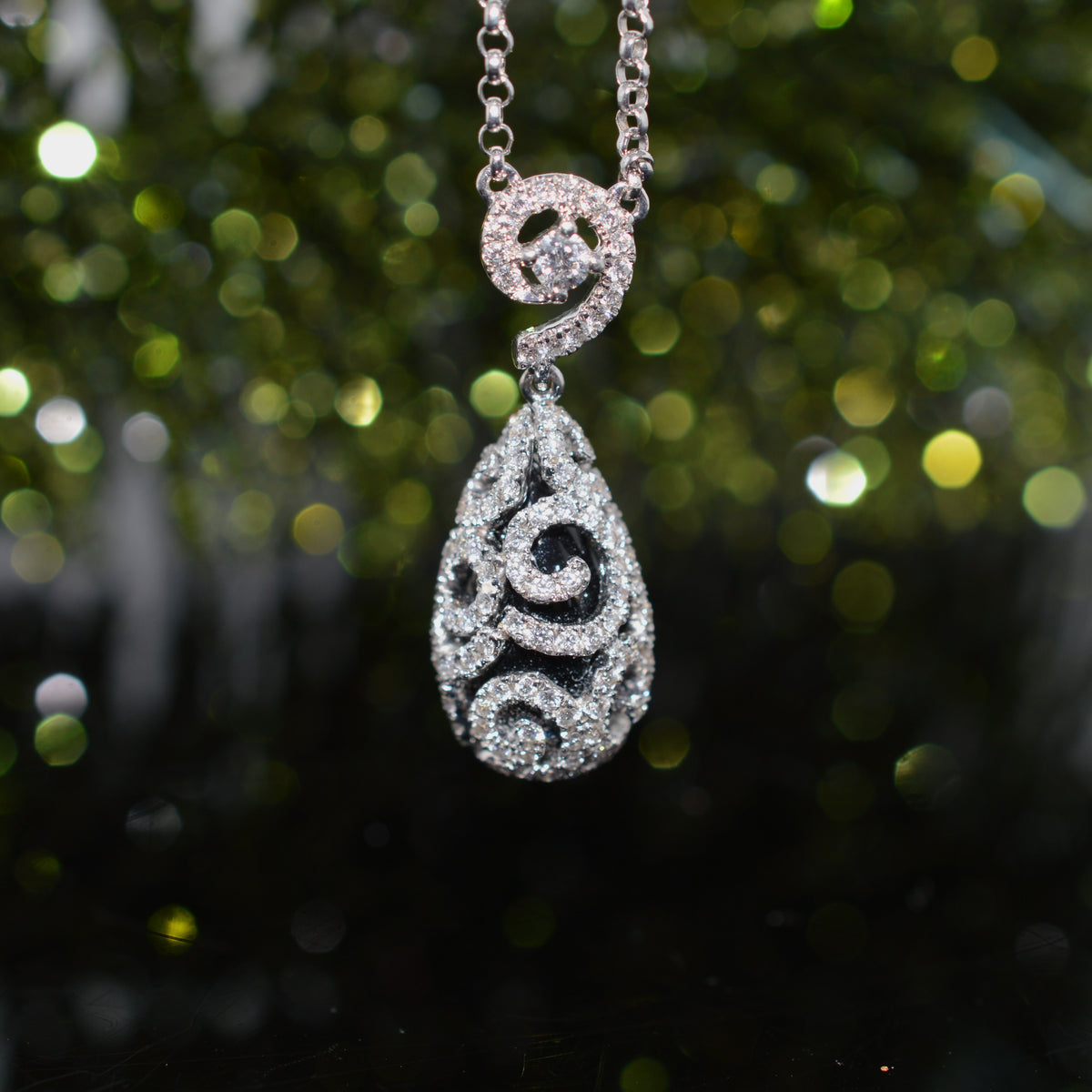 18K White Gold Teardrop Black Onyx Pendant Encased In Diamonds