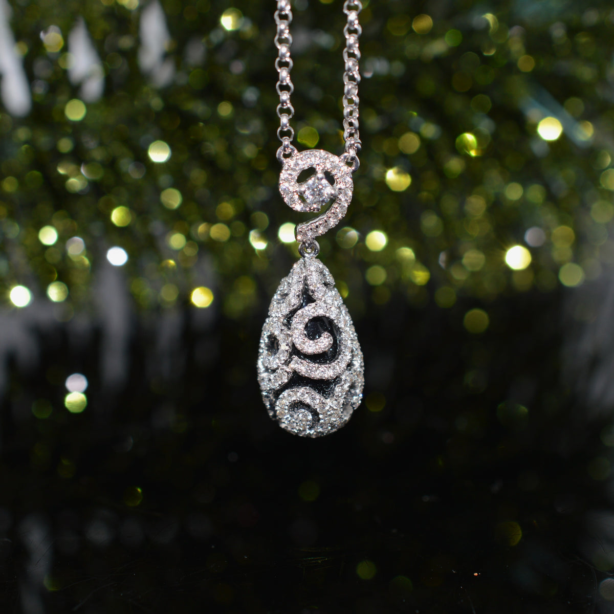 18K White Gold Teardrop Black Onyx Pendant Encased In Diamonds