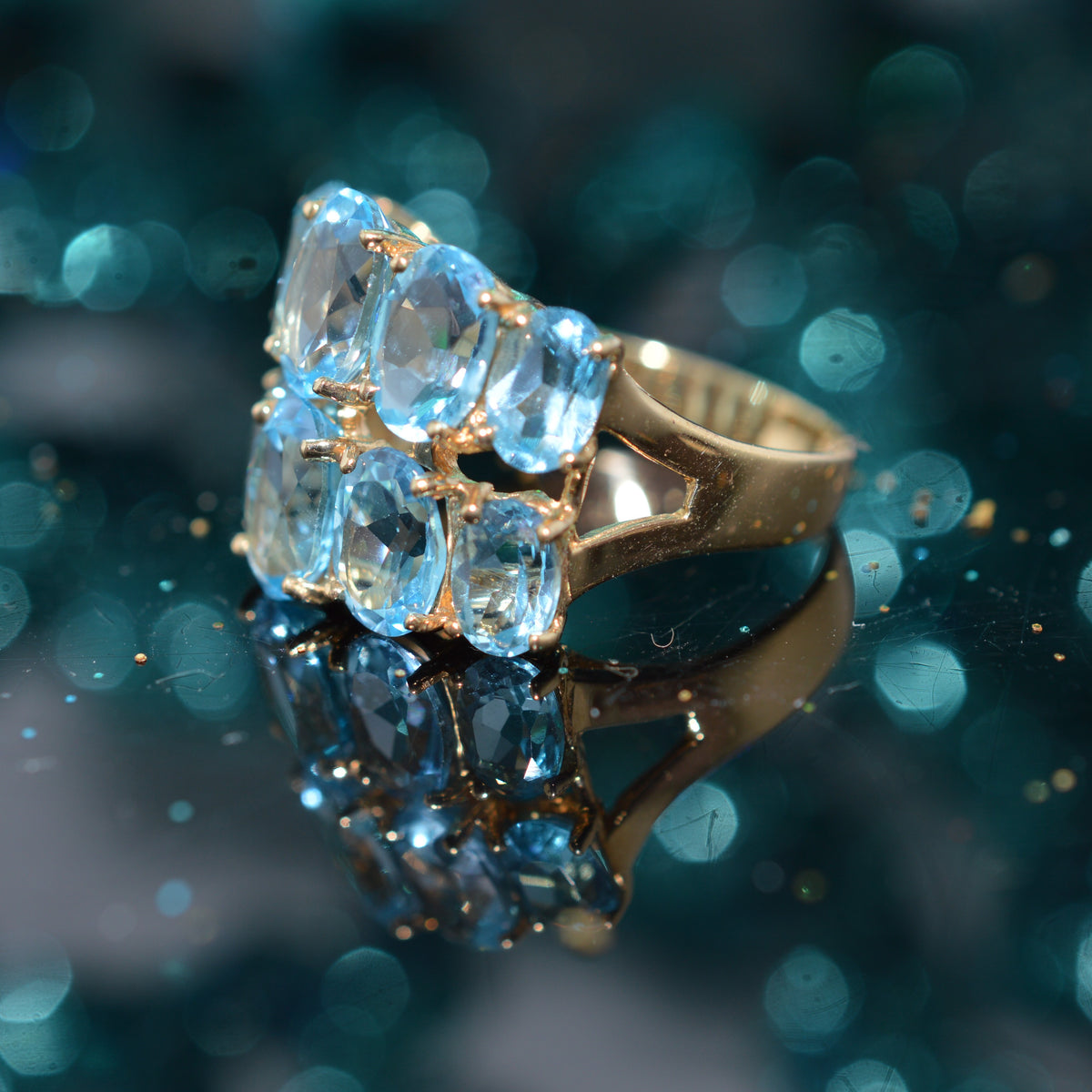 10K Yellow Gold Two Row Oval Blue Topaz Ring