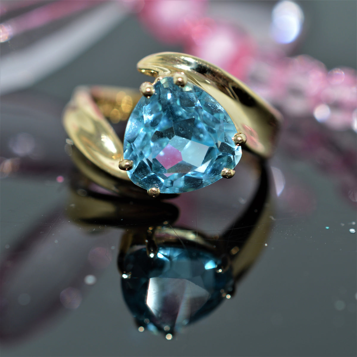 14K Yellow Gold Trillion Cut Blue Topaz Ring