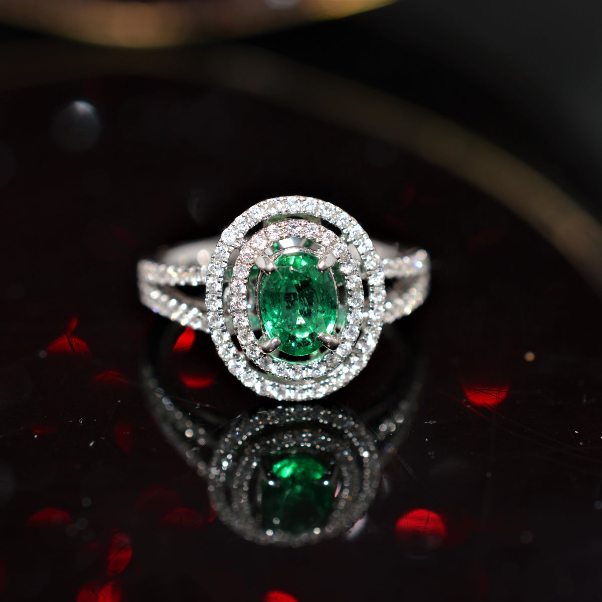 18K White Gold Oval Cut Emerald and Double Diamond Halo Ring