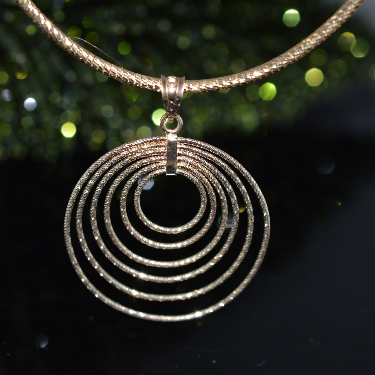 14K Yellow Gold 17 Inch Long Omega With Nested Circles Pendant