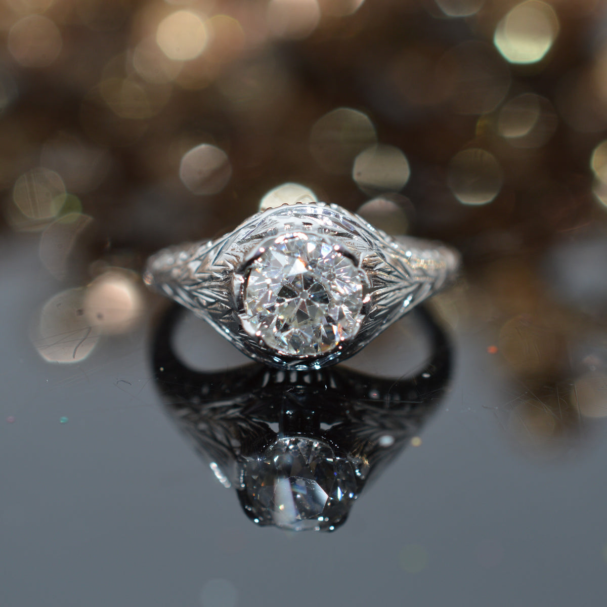 18K White Gold Antique Filigree Ring With A 1.12 Carat Old Mine Cut Diamond