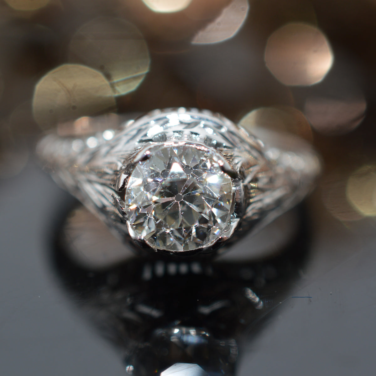 18K White Gold Antique Filigree Ring With A 1.12 Carat Old Mine Cut Diamond