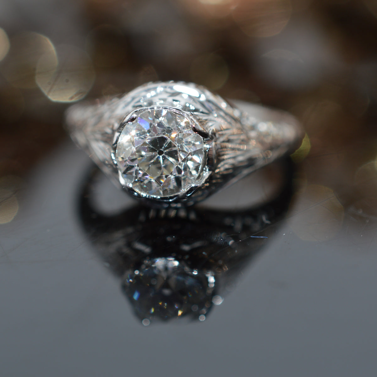 18K White Gold Antique Filigree Ring With A 1.12 Carat Old Mine Cut Diamond