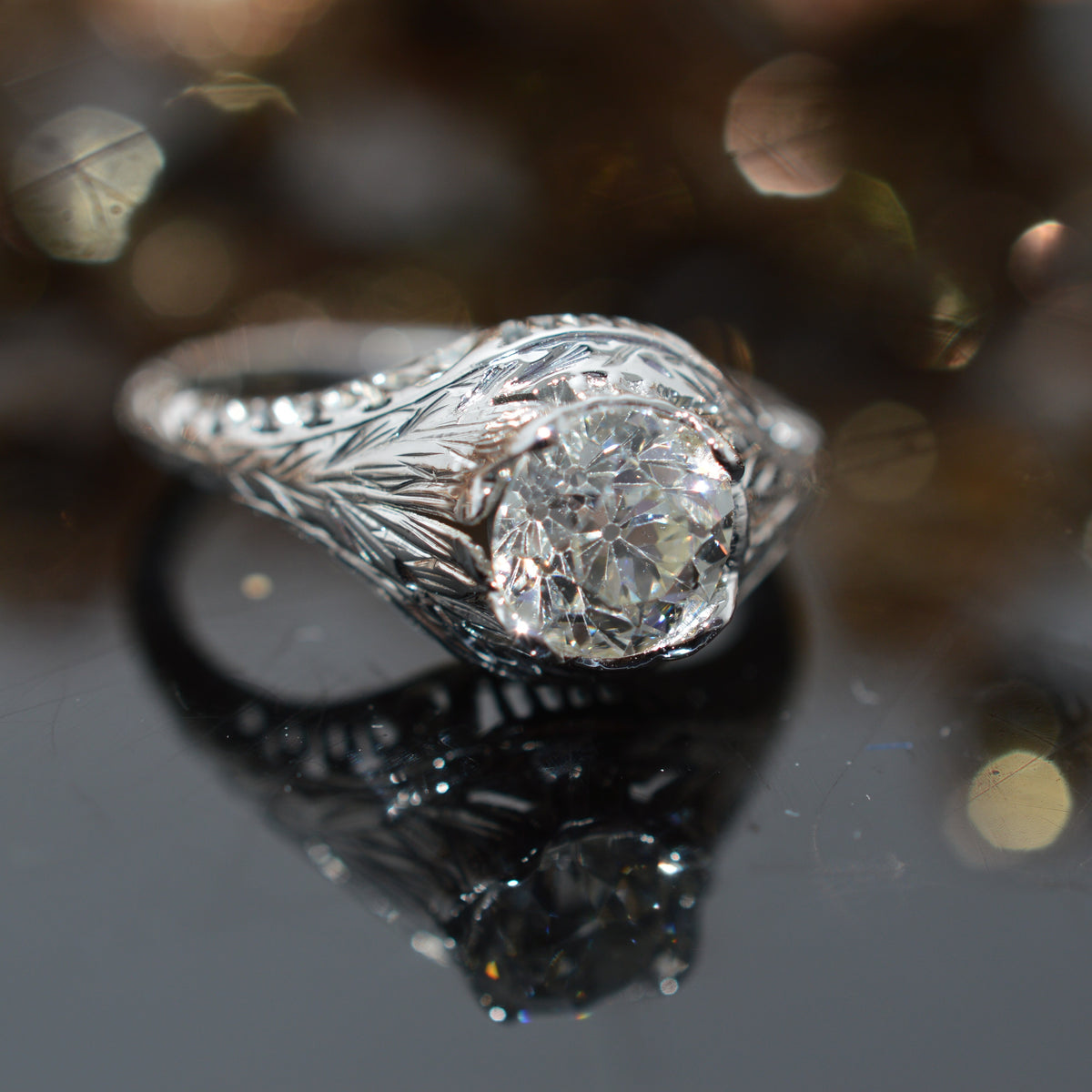 18K White Gold Antique Filigree Ring With A 1.12 Carat Old Mine Cut Diamond