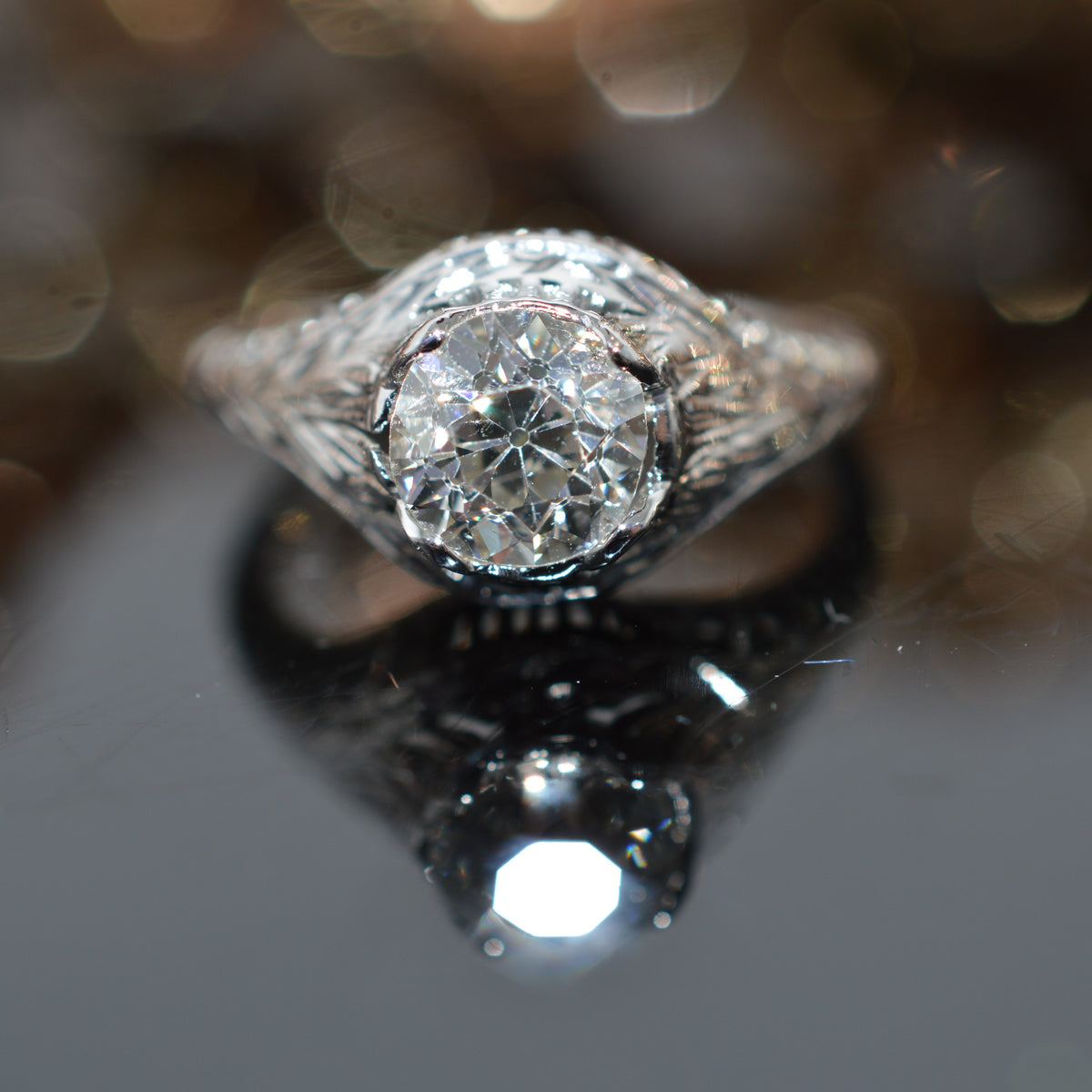 18K White Gold Antique Filigree Ring With A 1.12 Carat Old Mine Cut Diamond
