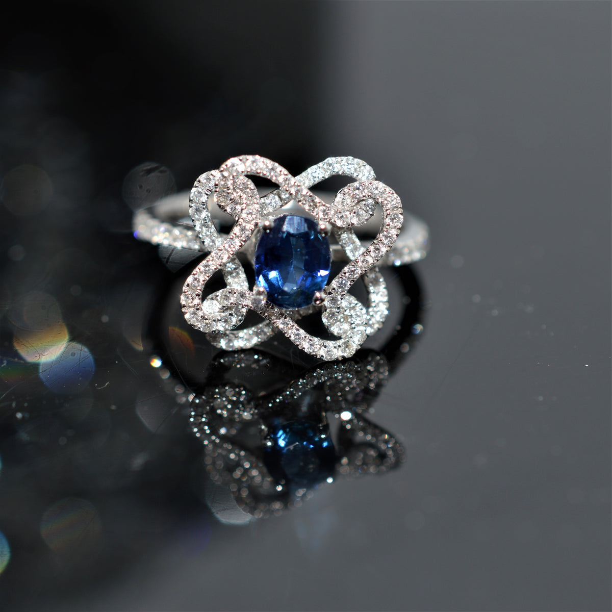 18K White Gold Oval Blue Sapphire And Diamond Infinity Ring