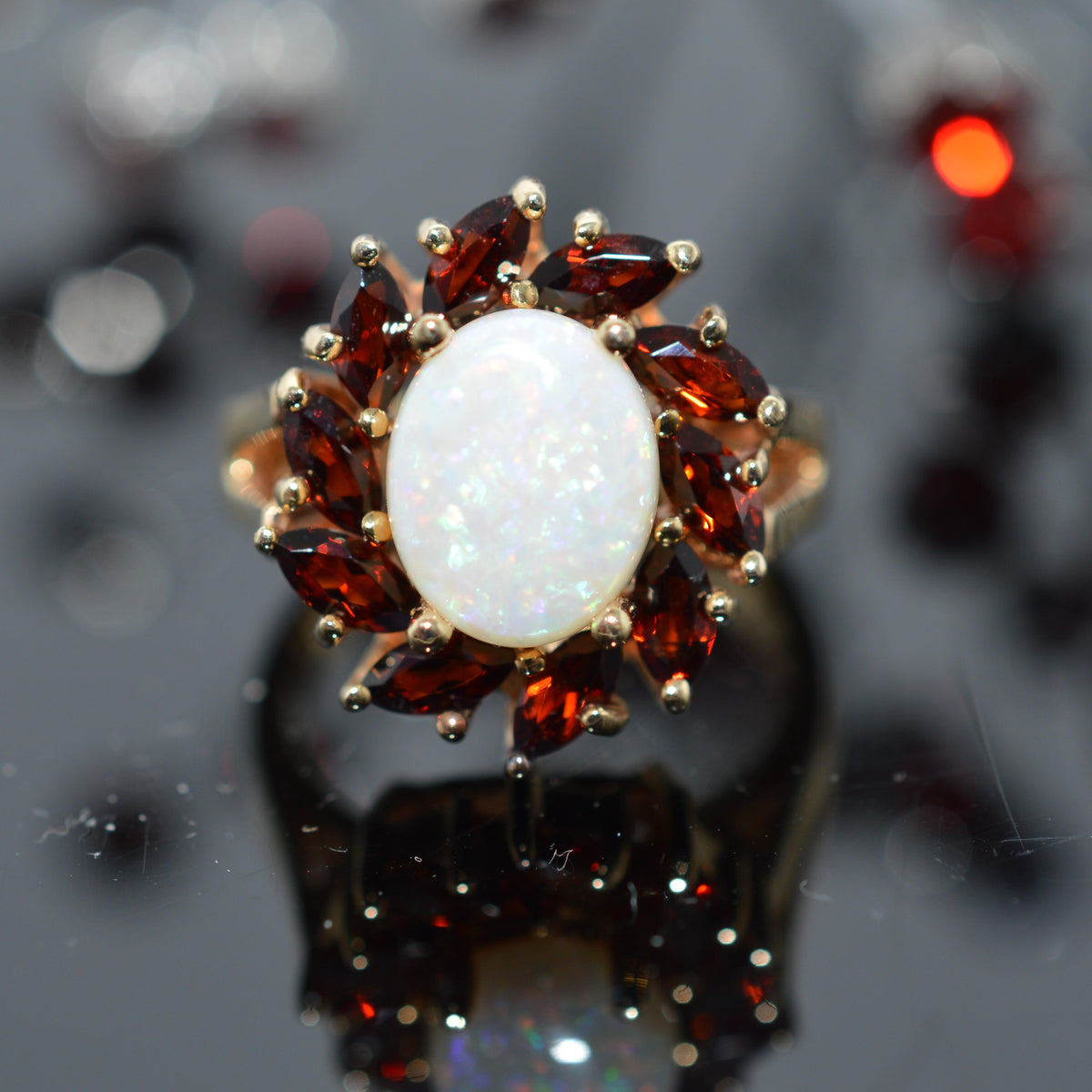 14K Yellow Gold Oval Opal With Marquise Garnet Halo Ring