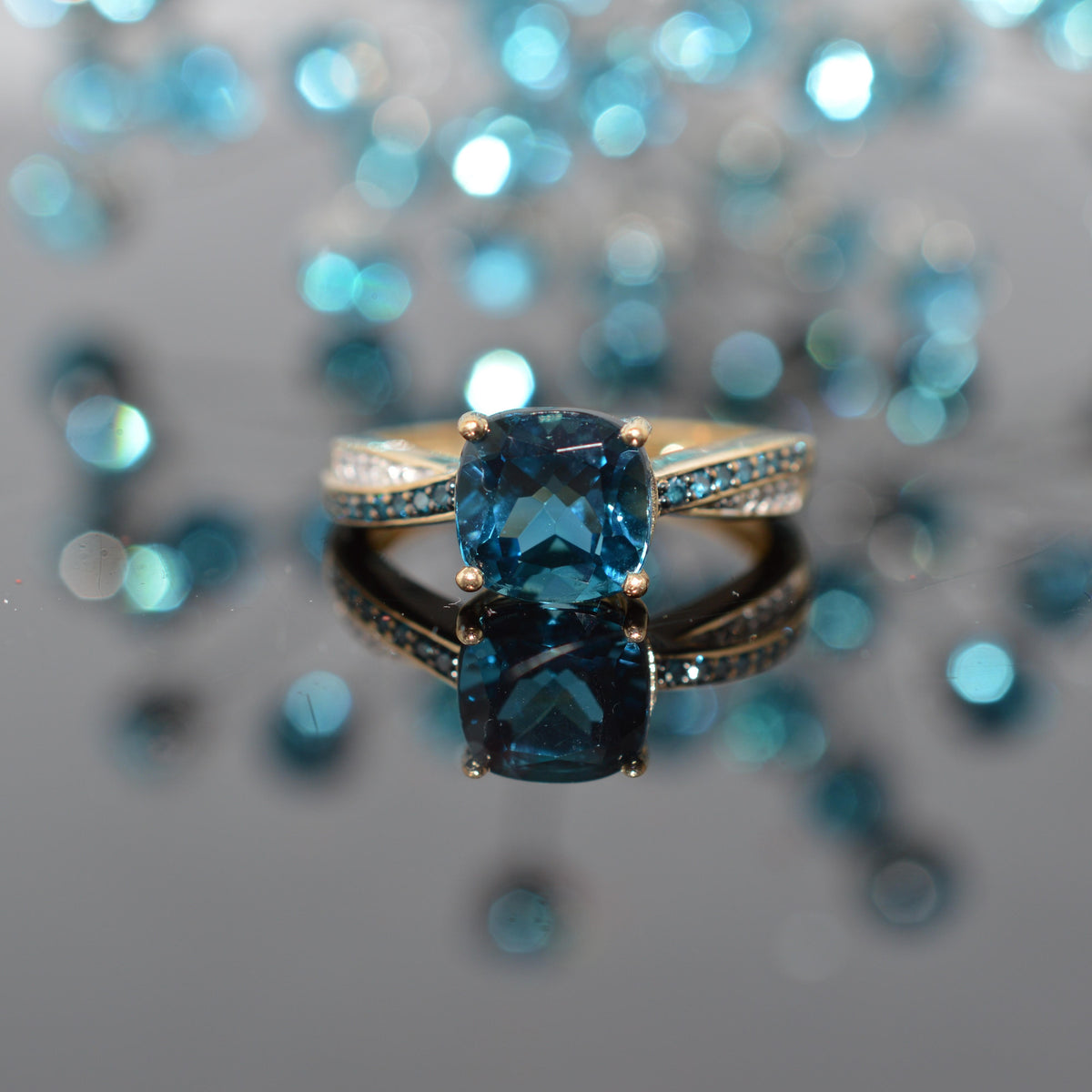 10K Yellow Gold Blue Topaz With Blue And White Diamonds Ring