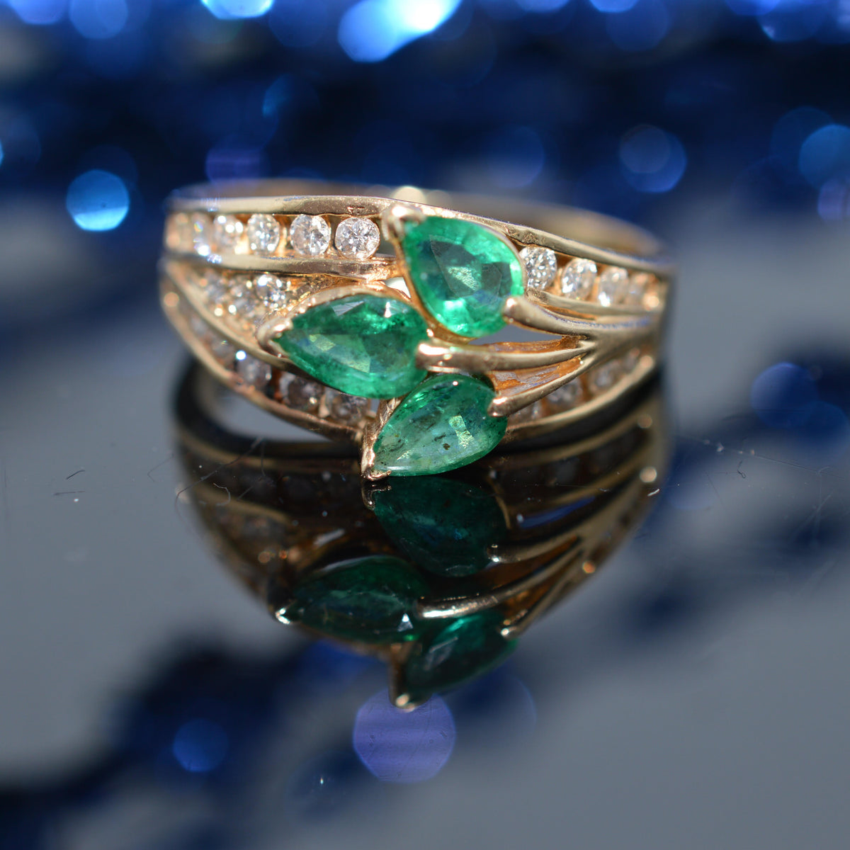 14K Yellow Gold Diamond Ring With 3 Pear Cut Emeralds