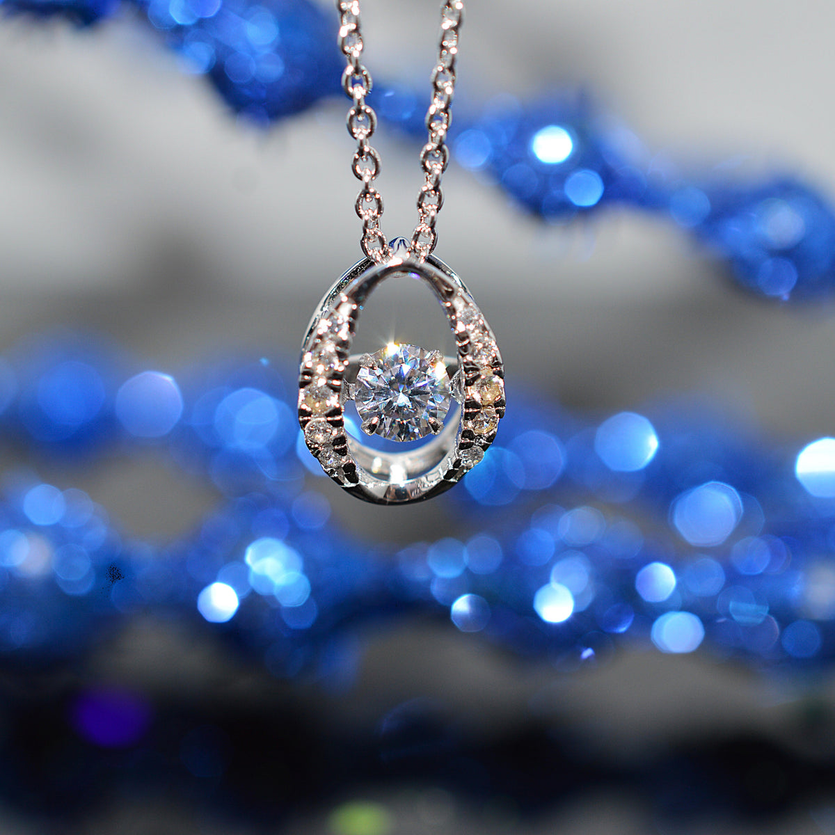 Sterling Silver Dancing Simulated Diamond Pendant With Chain