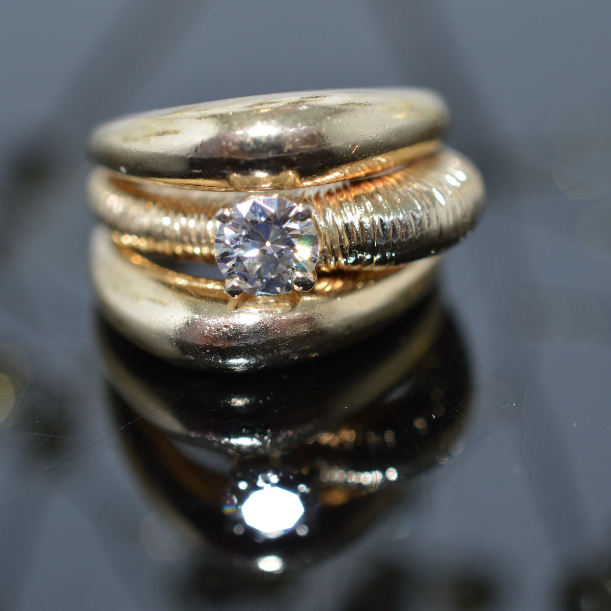 Unique 14K Yellow Gold Ring With A 1/2 Carat Round Diamond