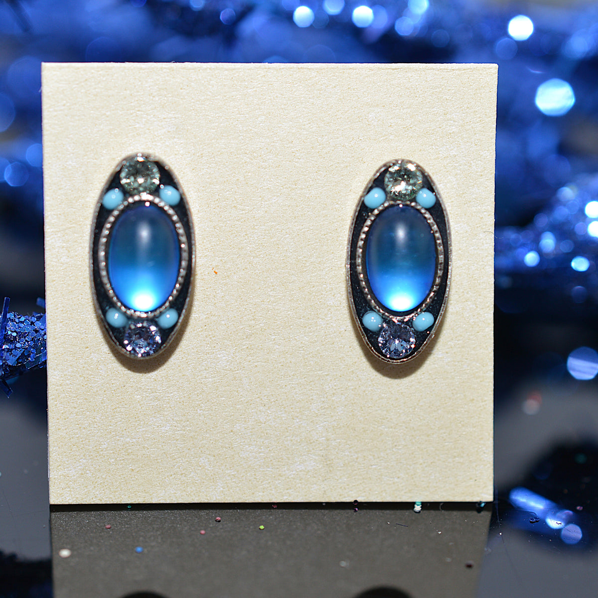 Antique Silver Plated oval Stud Earrings With Light Blue Moonlight Crystals by Firefly