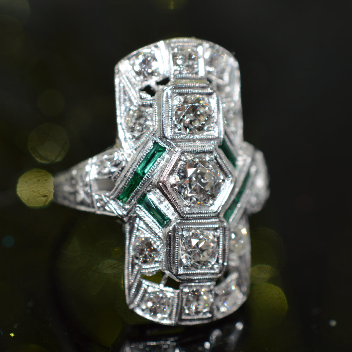 Platinum Antique 1 Carat Total Weight Diamond Ring With Synthetic Green Emeralds