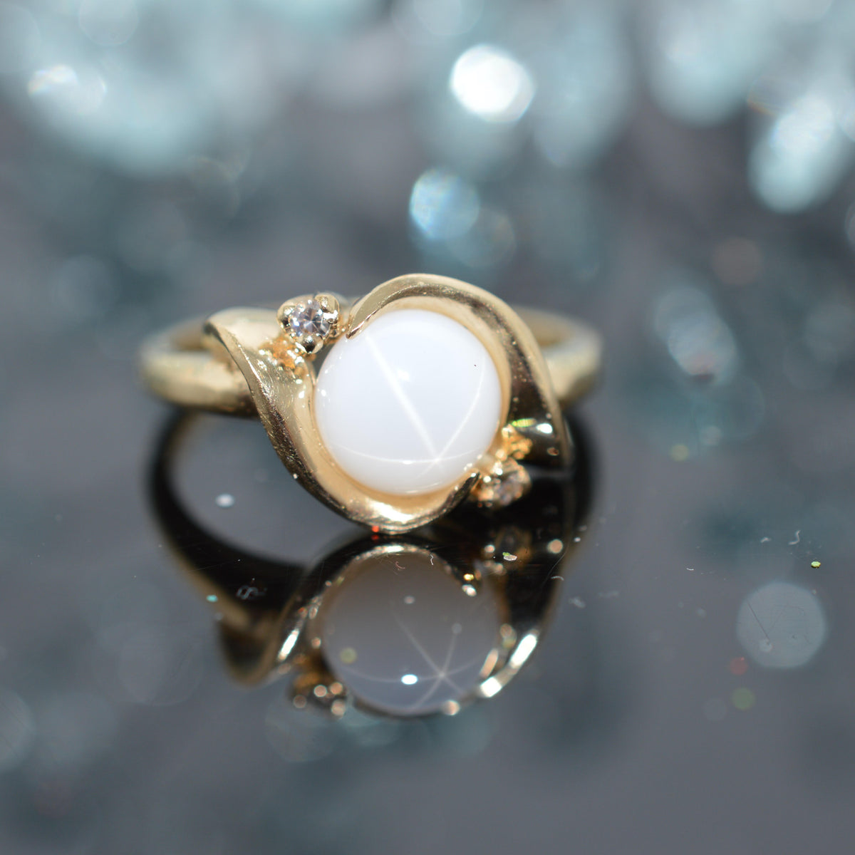 14K Yellow Gold Round White Synthetic Star Sapphire Ring With 2 Diamonds