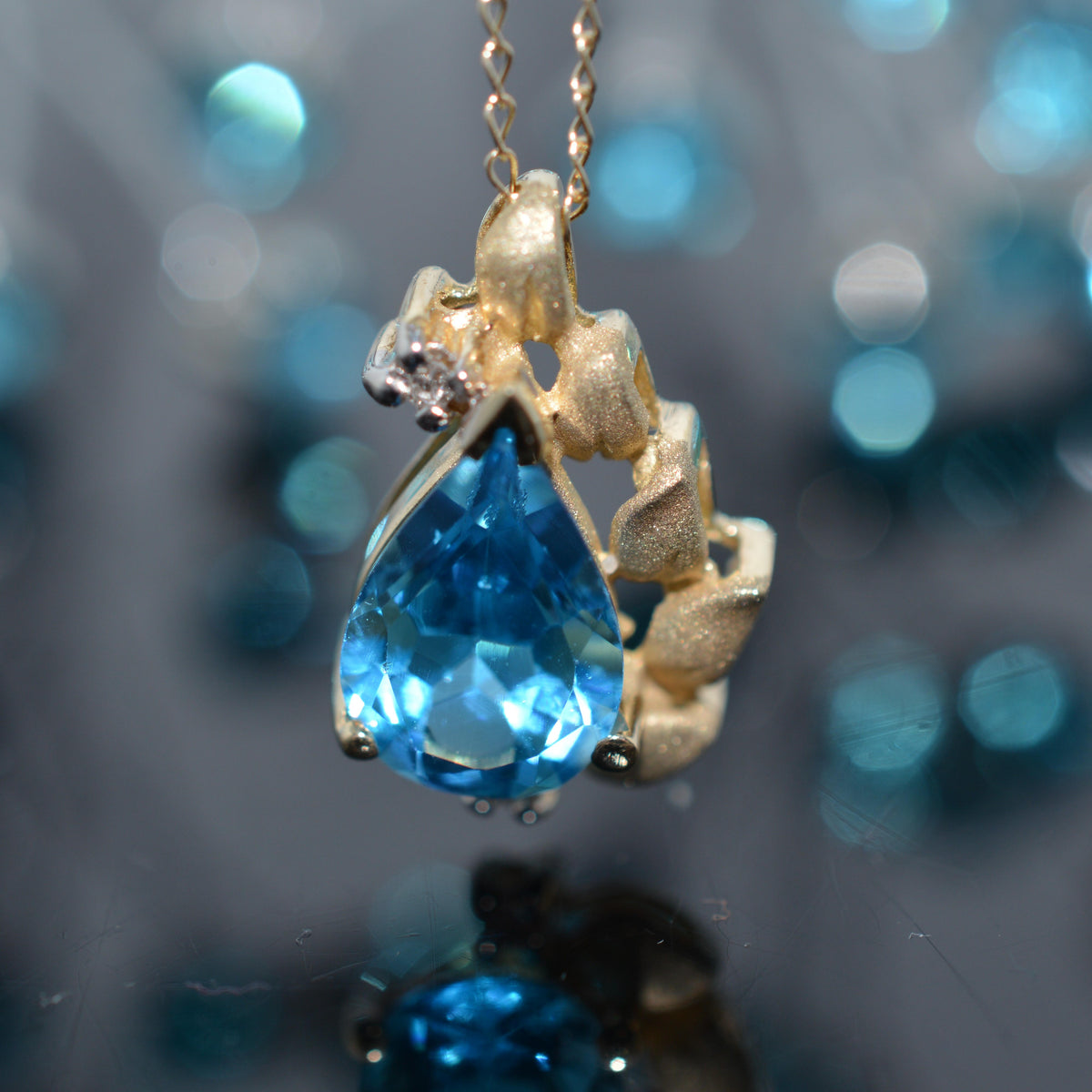 14K Yellow Gold Teardrop Blue Topaz & Diamond Pendant With Chain