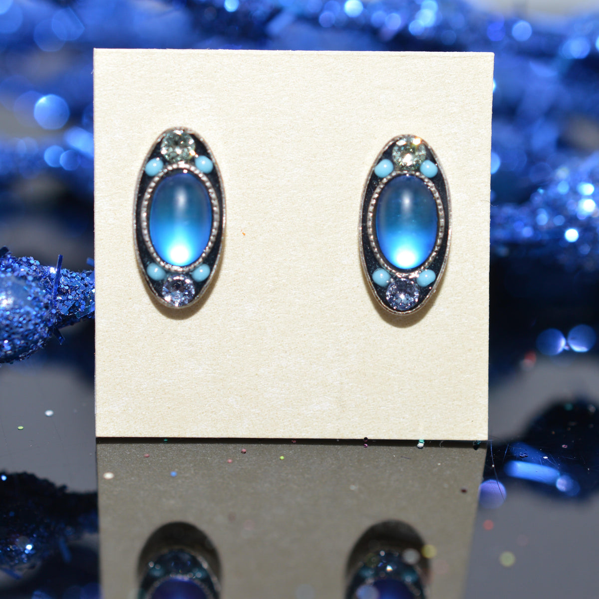 Antique Silver Plated oval Stud Earrings With Light Blue Moonlight Crystals by Firefly