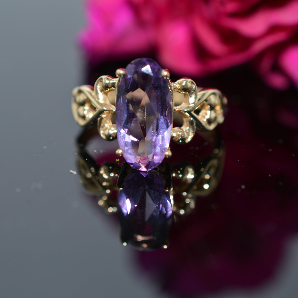 14K Yellow Gold Ring With An Elongated Oval Amethyst