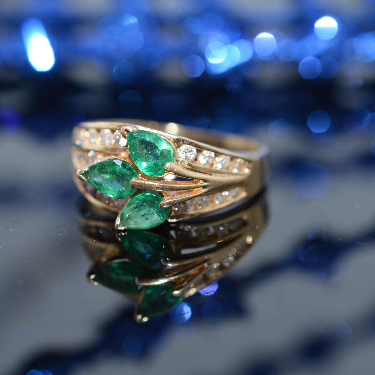 14K Yellow Gold Diamond Ring With 3 Pear Cut Emeralds