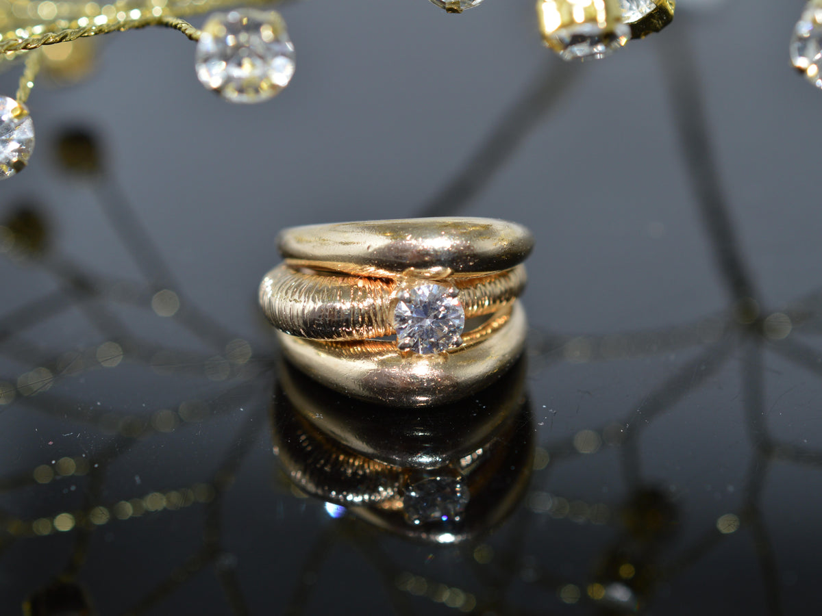 Unique 14K Yellow Gold Ring With A 1/2 Carat Round Diamond