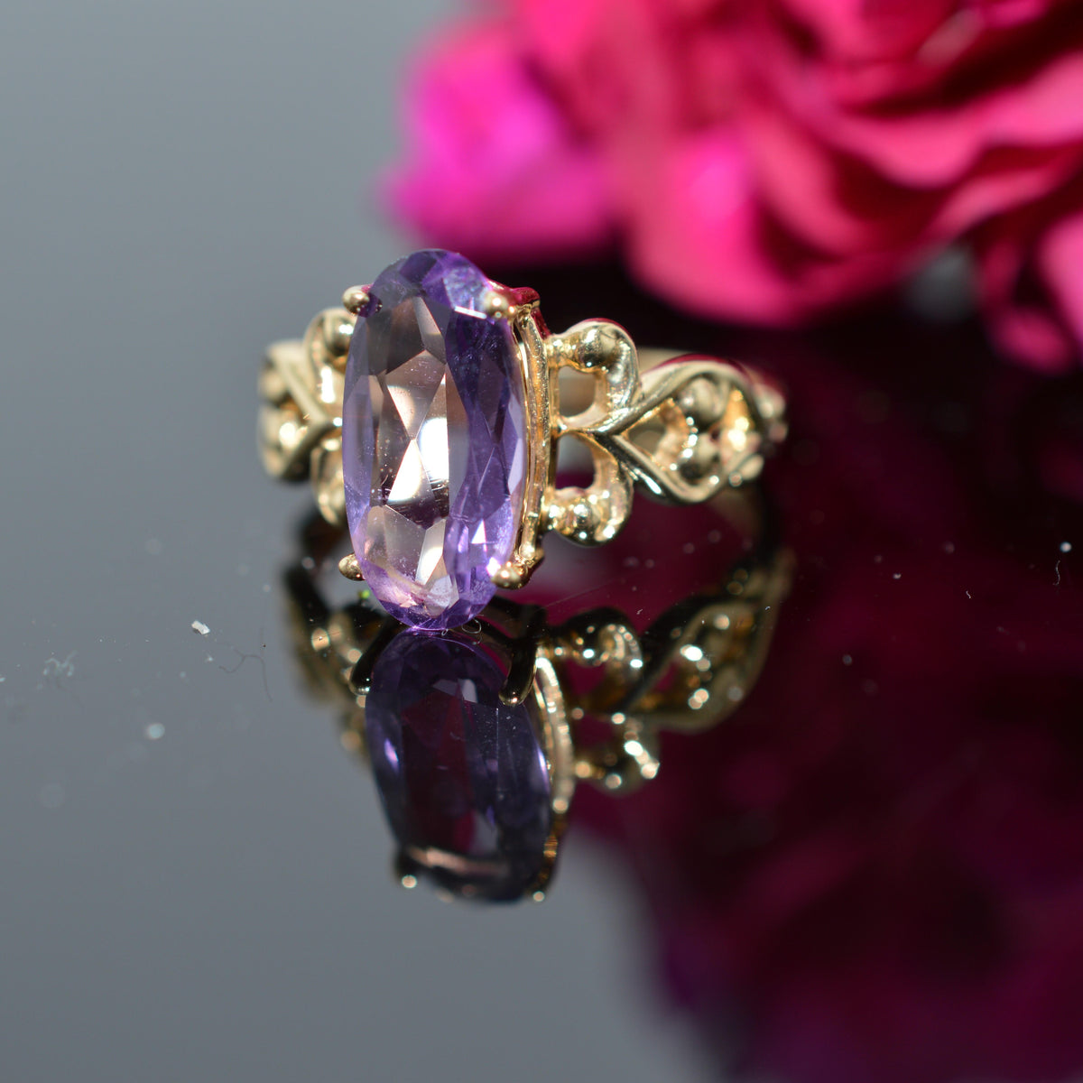 14K Yellow Gold Ring With An Elongated Oval Amethyst
