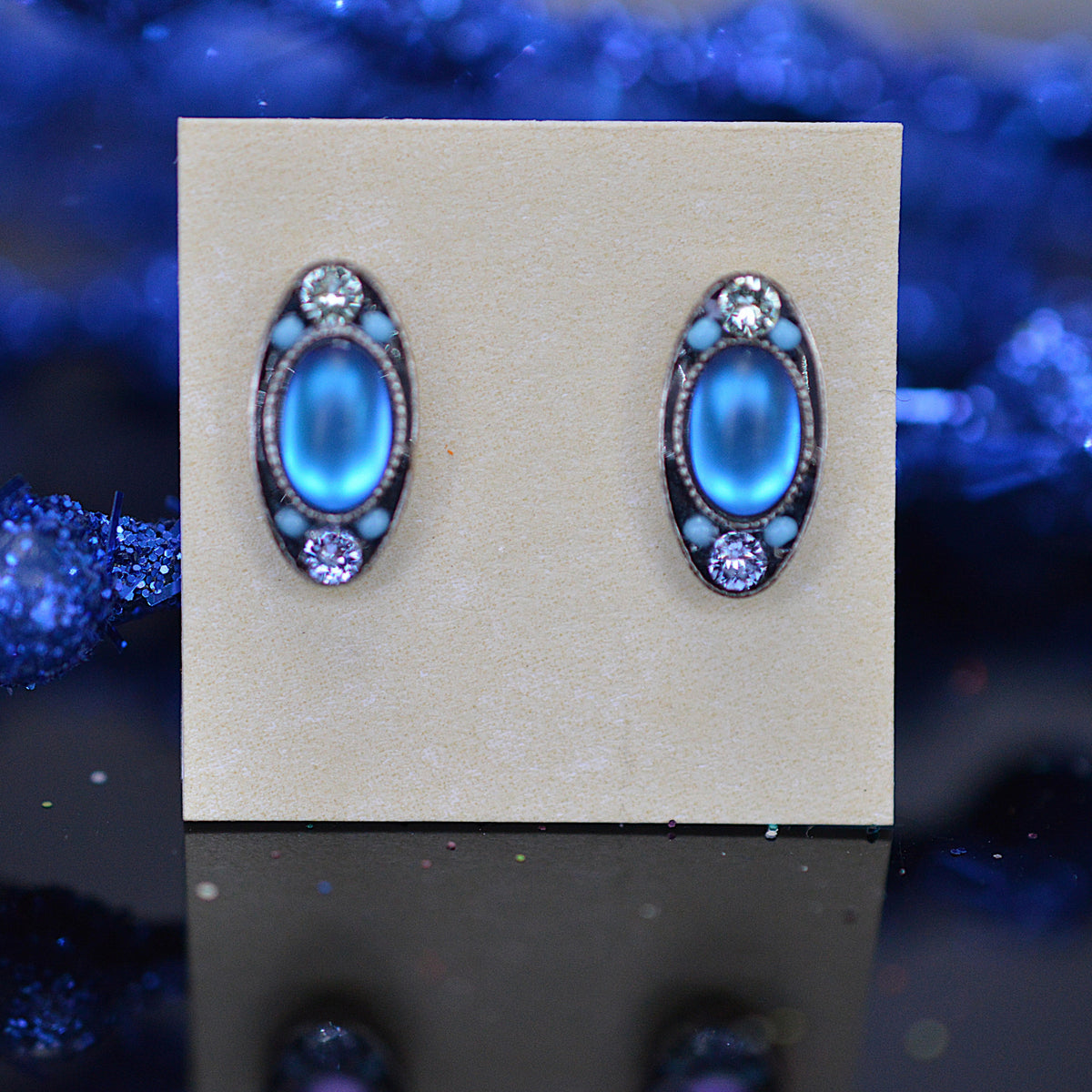 Antique Silver Plated oval Stud Earrings With Light Blue Moonlight Crystals by Firefly