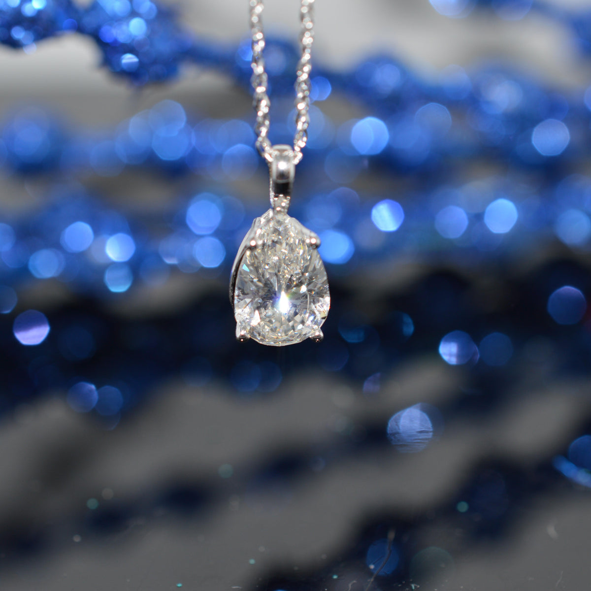 14K White Gold Chain With 1.96 Carat Pear Cut Diamond (GIA) Pendant