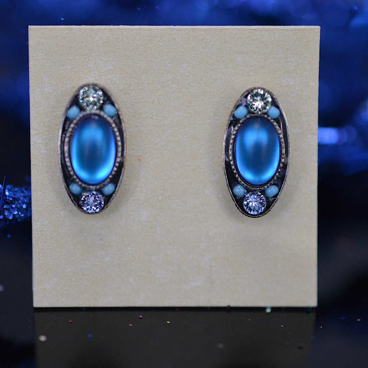 Antique Silver Plated oval Stud Earrings With Light Blue Moonlight Crystals by Firefly