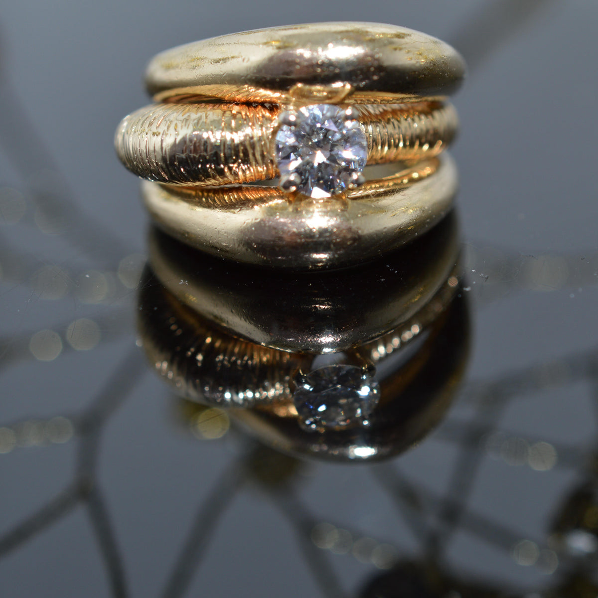 Unique 14K Yellow Gold Ring With A 1/2 Carat Round Diamond