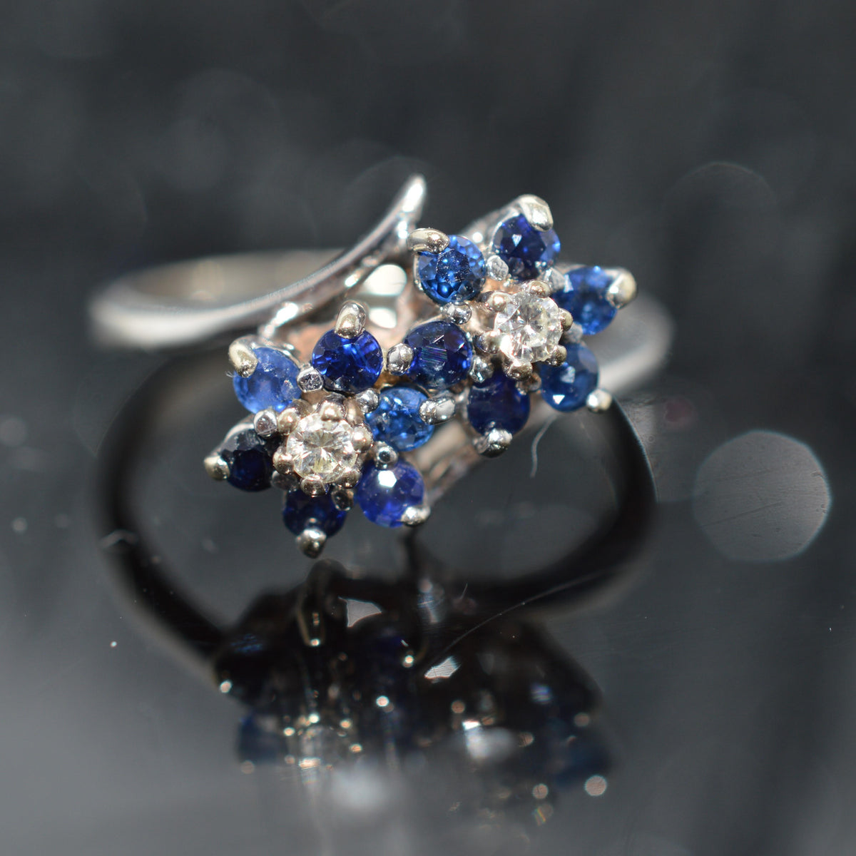 14K White Gold Ring With 2 Flower Shape Clusters Of Sapphires & Diamonds