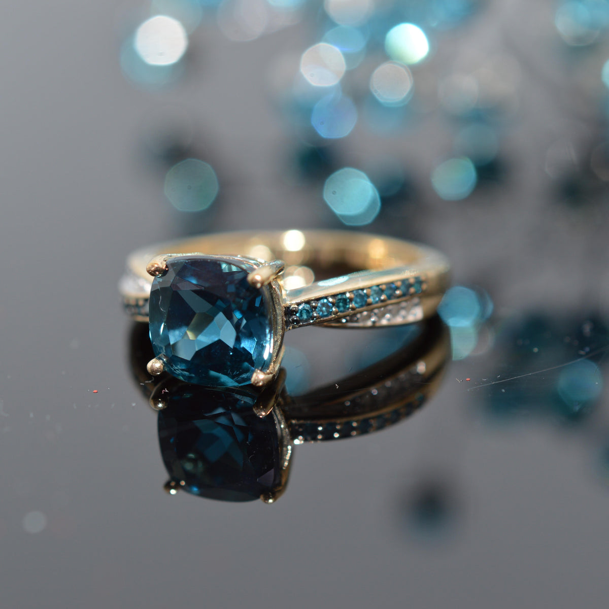 10K Yellow Gold Blue Topaz With Blue And White Diamonds Ring