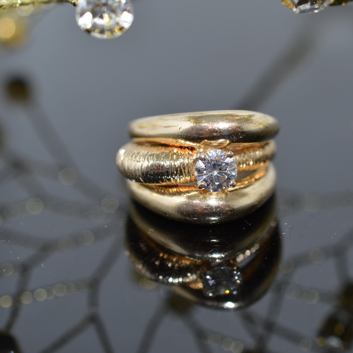 Unique 14K Yellow Gold Ring With A 1/2 Carat Round Diamond