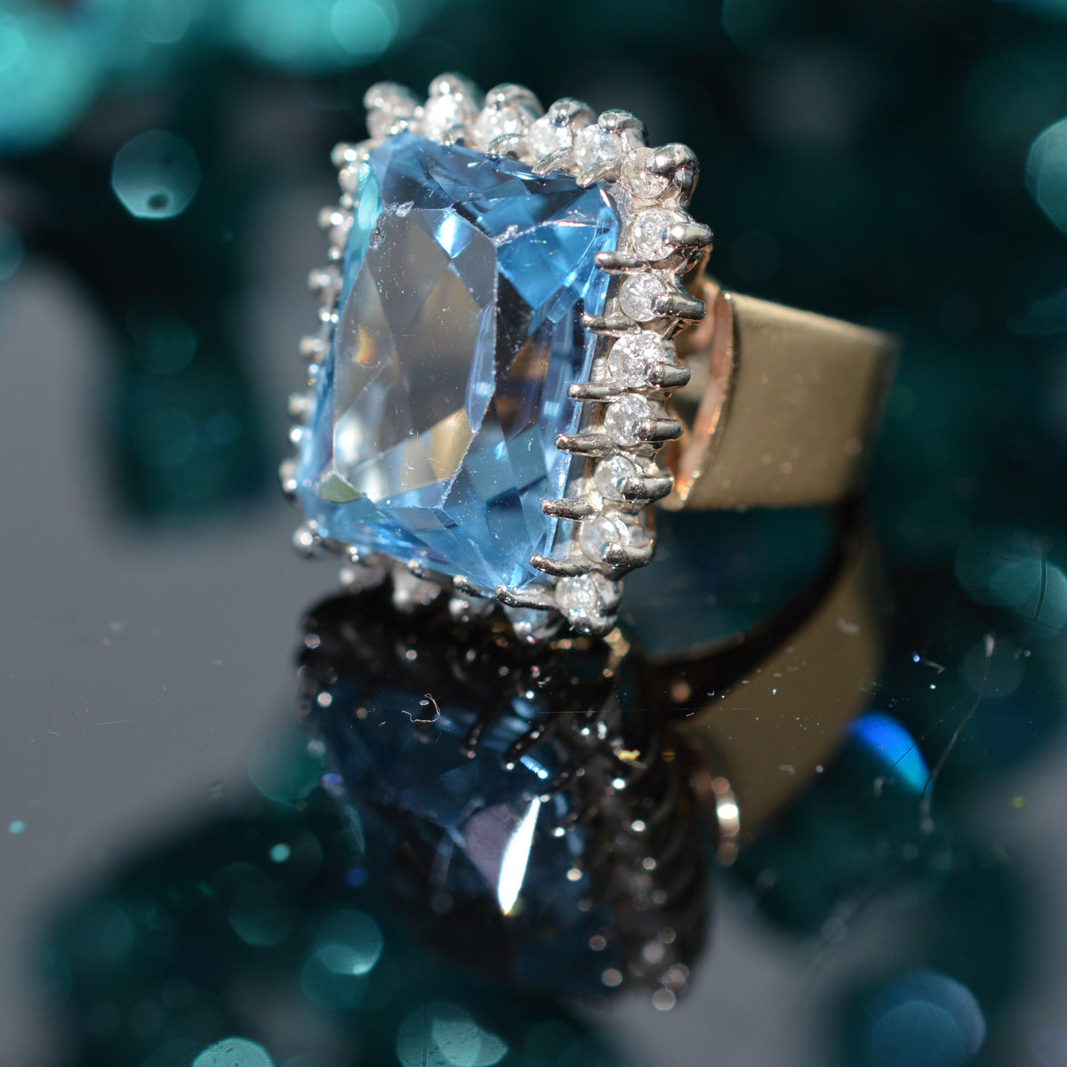 14K Two Tone Gold Ring With A Large Synthetic Spinel & A Halo Of Diamonds