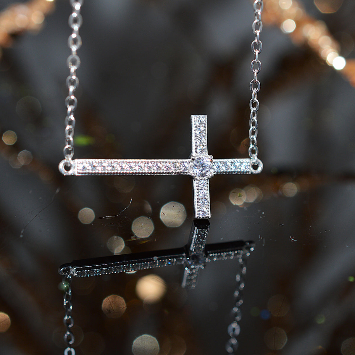 Sterling Silver East to West Cross Necklace With Simulated Diamonds