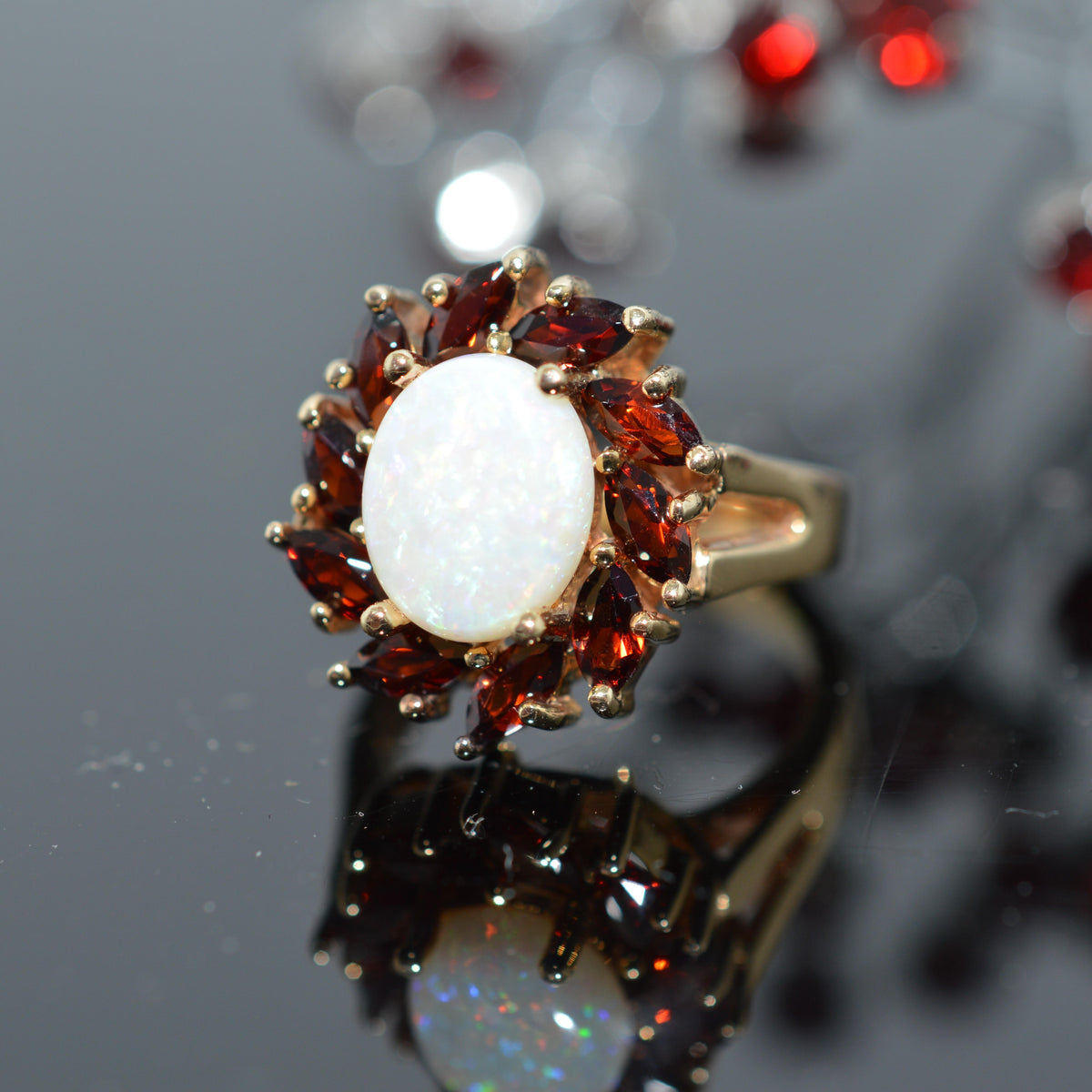 14K Yellow Gold Oval Opal With Marquise Garnet Halo Ring