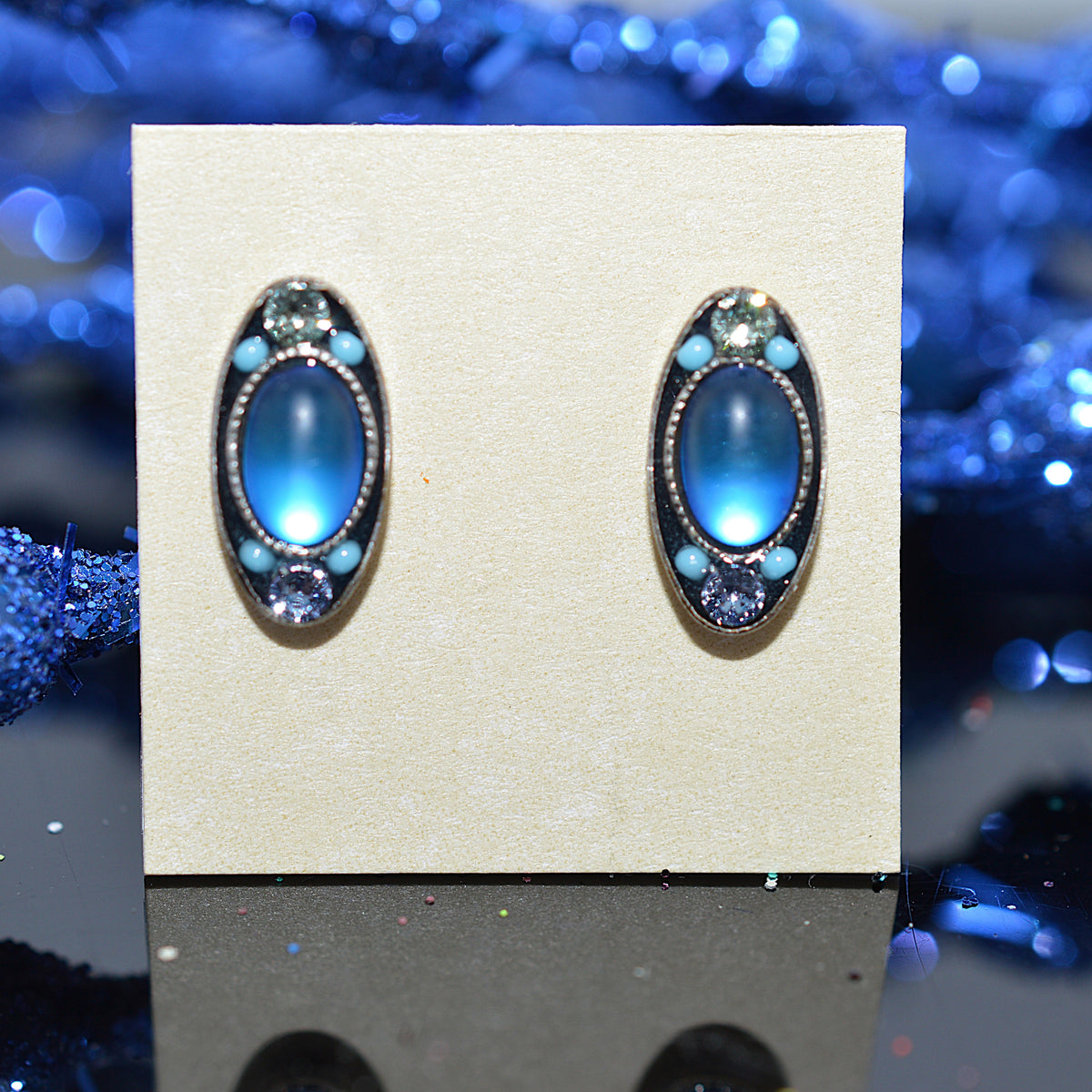 Antique Silver Plated oval Stud Earrings With Light Blue Moonlight Crystals by Firefly