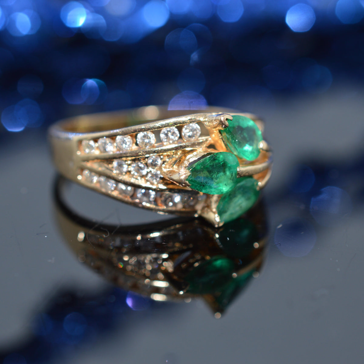14K Yellow Gold Diamond Ring With 3 Pear Cut Emeralds