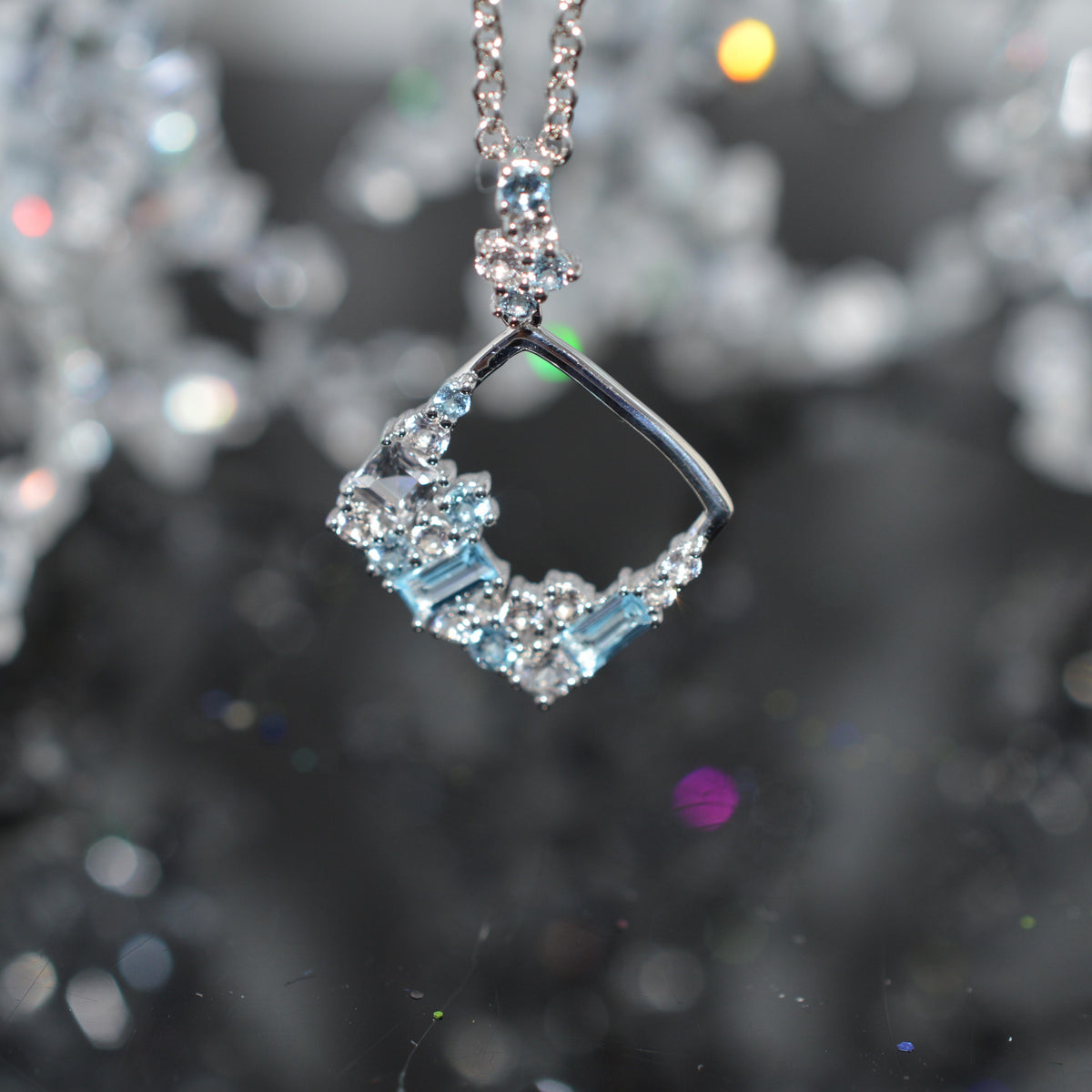 Sterling Silver Chain With Square Confetti Pendant Set With White & Blue Topaz Gemstones