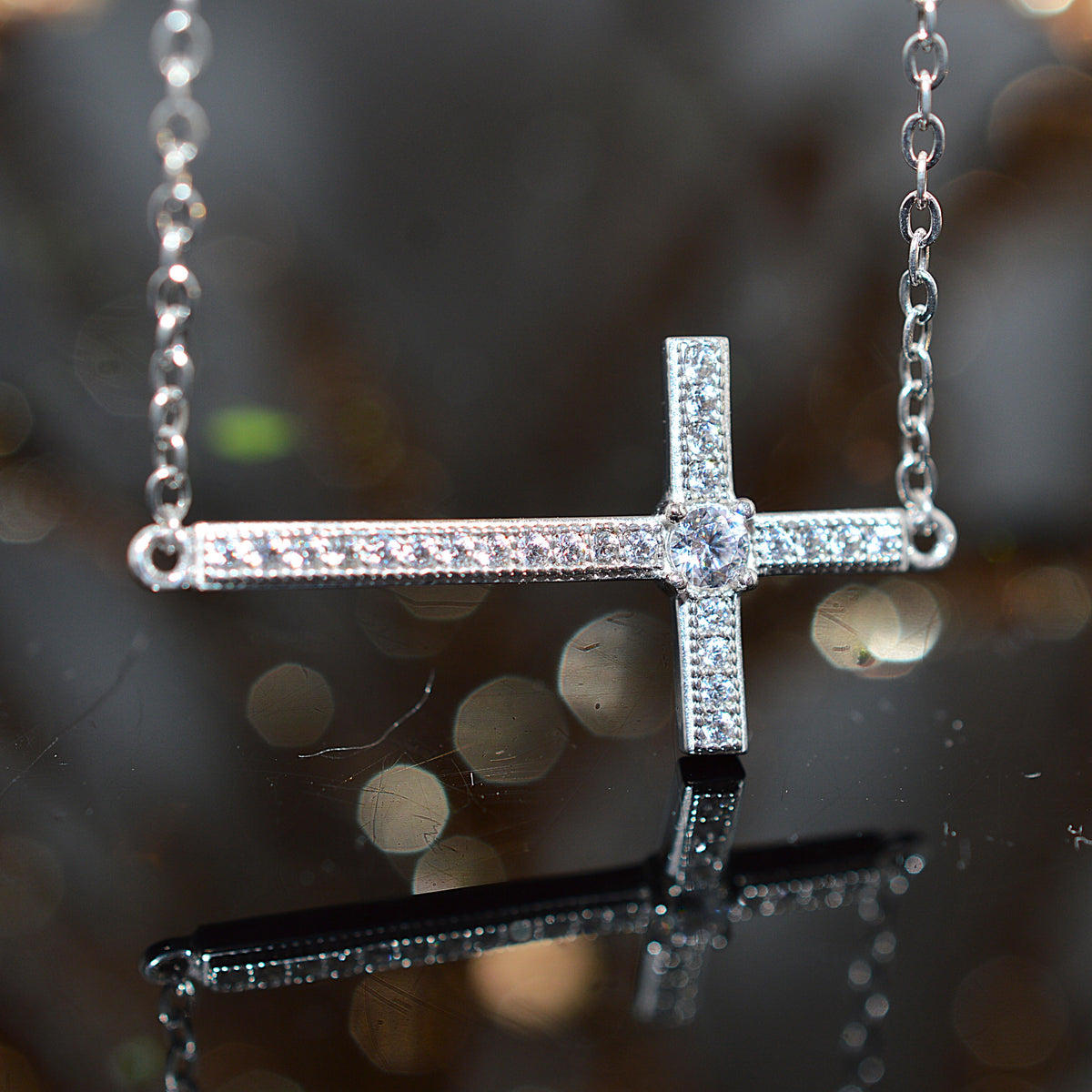 Sterling Silver East to West Cross Necklace With Simulated Diamonds