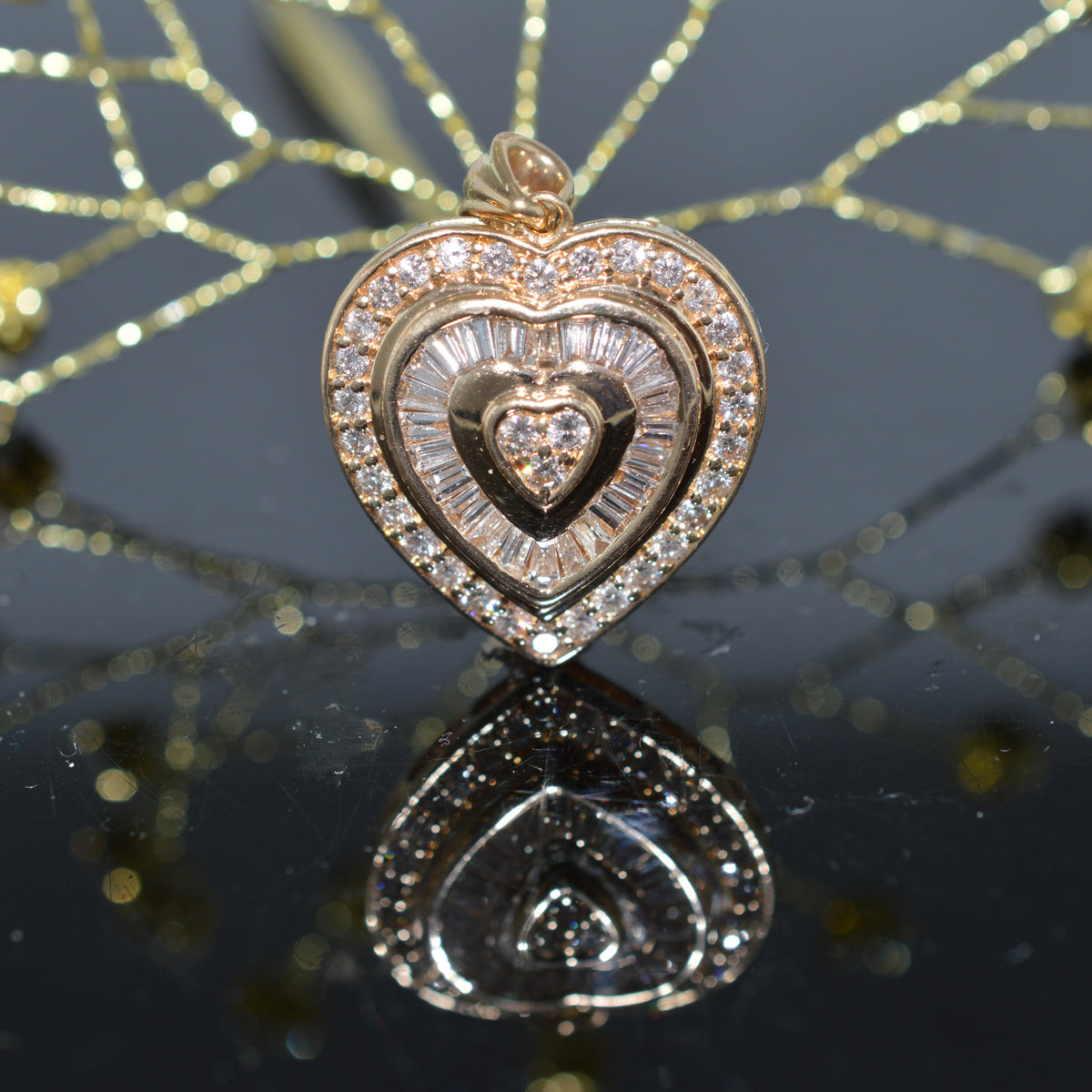 A Stunning 14K Yellow Gold 2 Carat Total Weight Diamond Heart Pendant