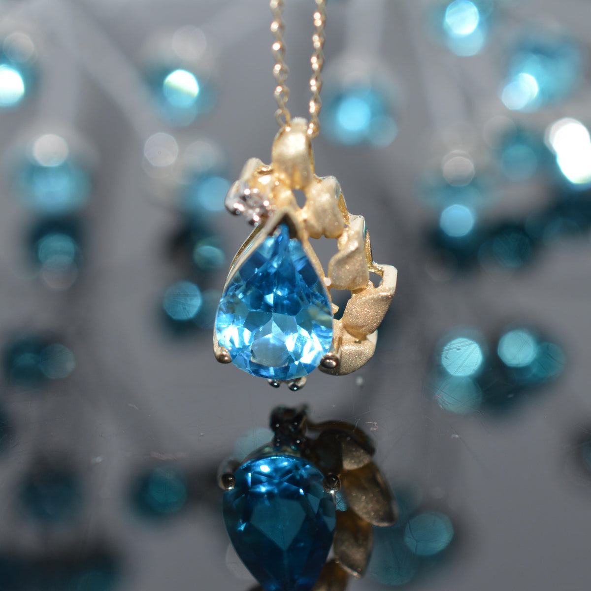 14K Yellow Gold Teardrop Blue Topaz & Diamond Pendant With Chain