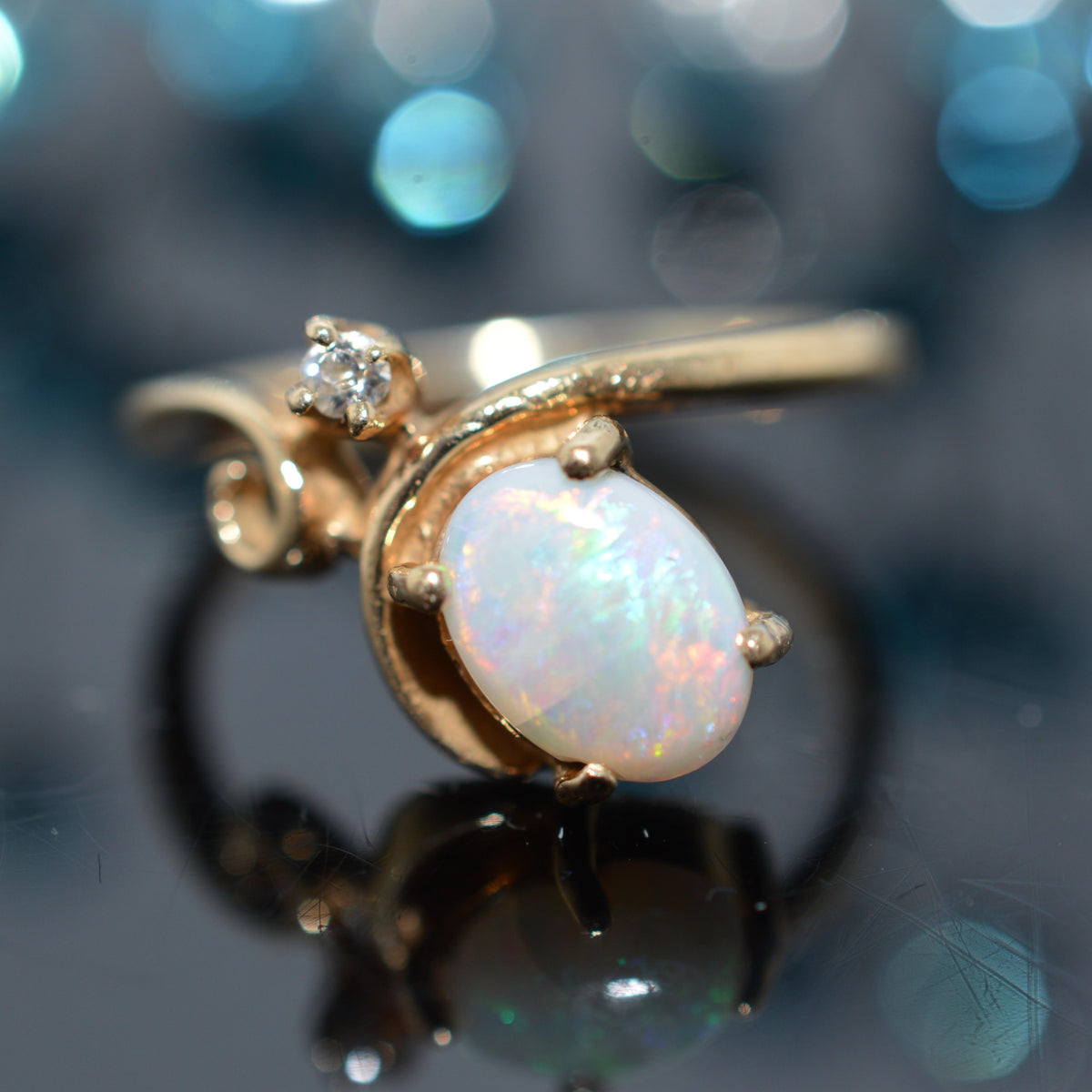 14K Yellow Gold Oval Opal Ring With Old Mine Cut Diamond